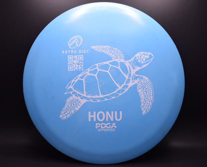 Honu - blue with a white stamp.