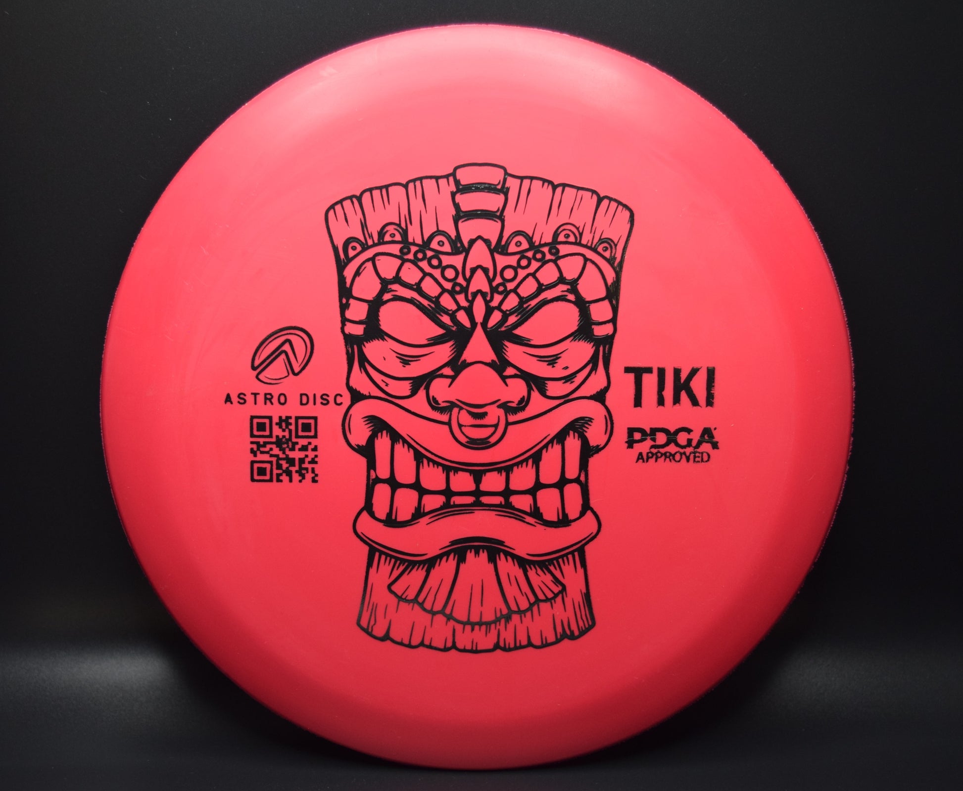 Tiki - red with a black stamp.